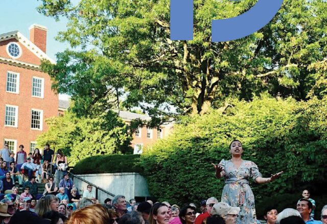 Cover of the 2019 Annual Report. A large blue 19 in the upper right corner. The cover is an image of a woman standing on the steps of a shady college campus surrounded by a large audience seated around her. She sings.