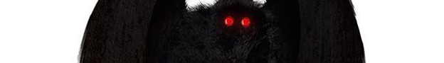 Black image with shining red eyes.