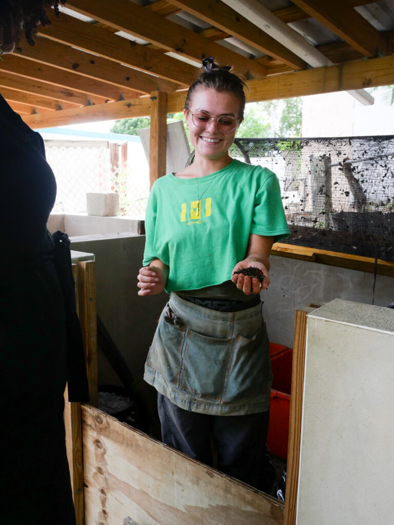 Mujeres de Islas member, Marissa Otero, explains the Mujeres de Islas compost project.