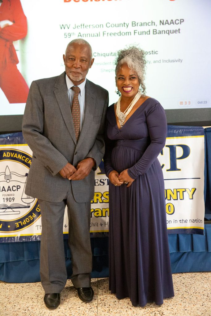 Jamile Jones and George Rutherford at the 59th Annual Jefferson County WV NAACP Freedom Fund Banquet. Mr. Rutherford was recognized for 60 years of service as the Jefferson County NAACP President as he prepared to retire the position. Credit: Jamila Jones.